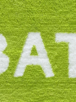 Titelseite -KIBEK Verkäufe Haiti Badmatte Gruen lup